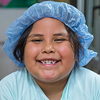 Patient-in-scrubs-smiling